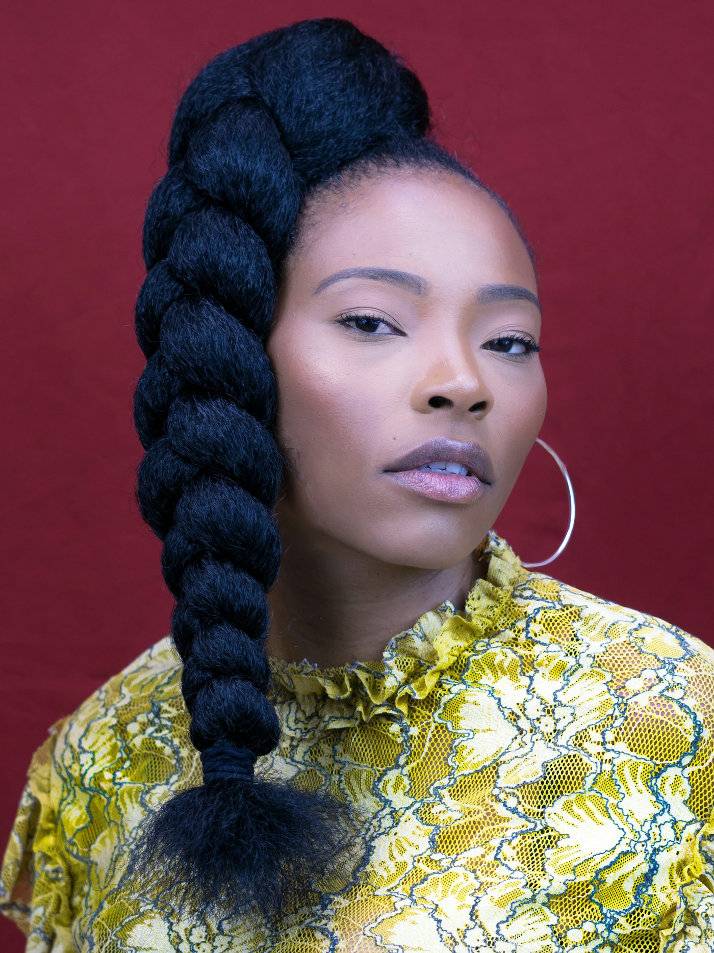 Black woman with braided hairstyle