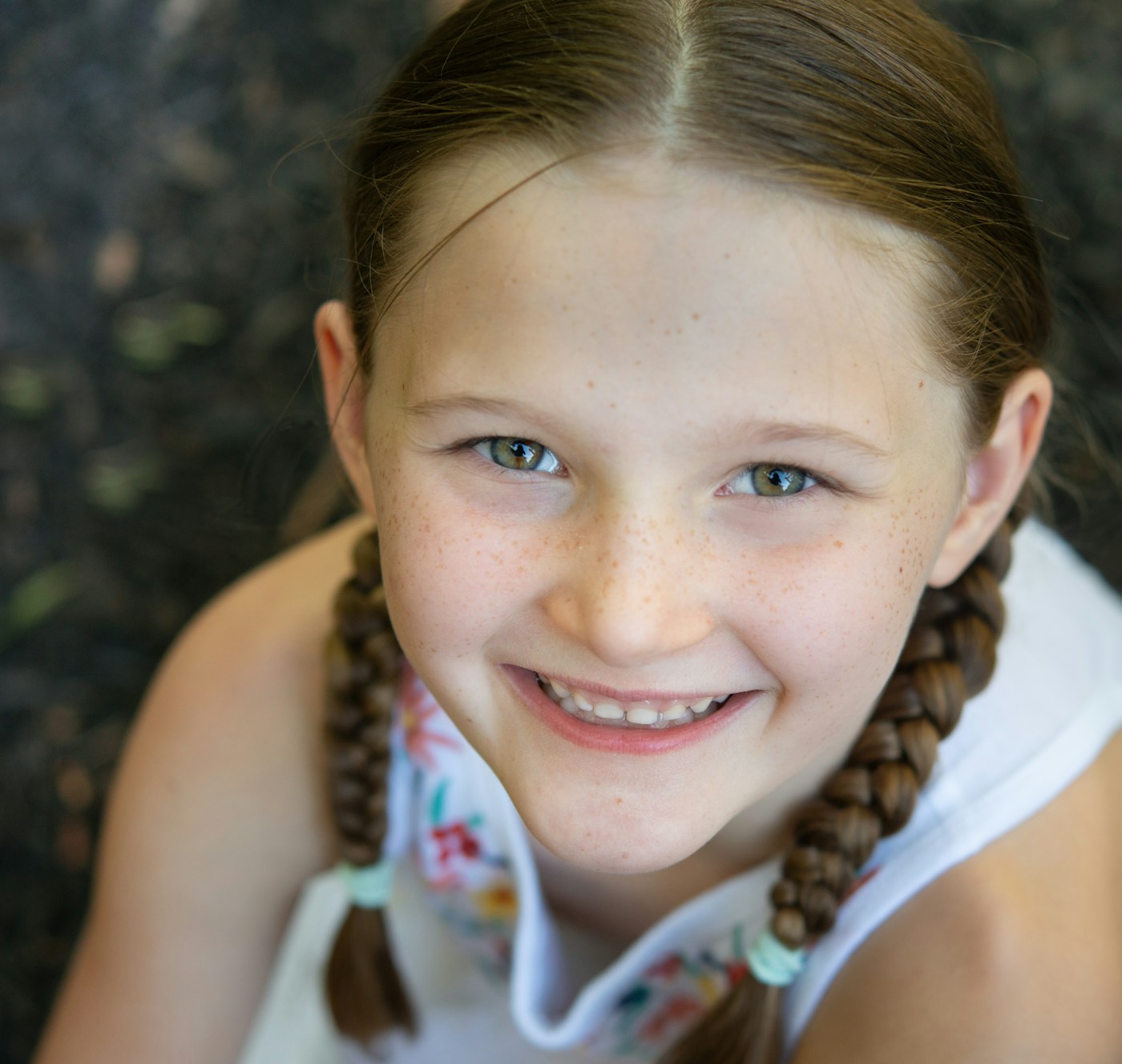 Child with braided hairstyle